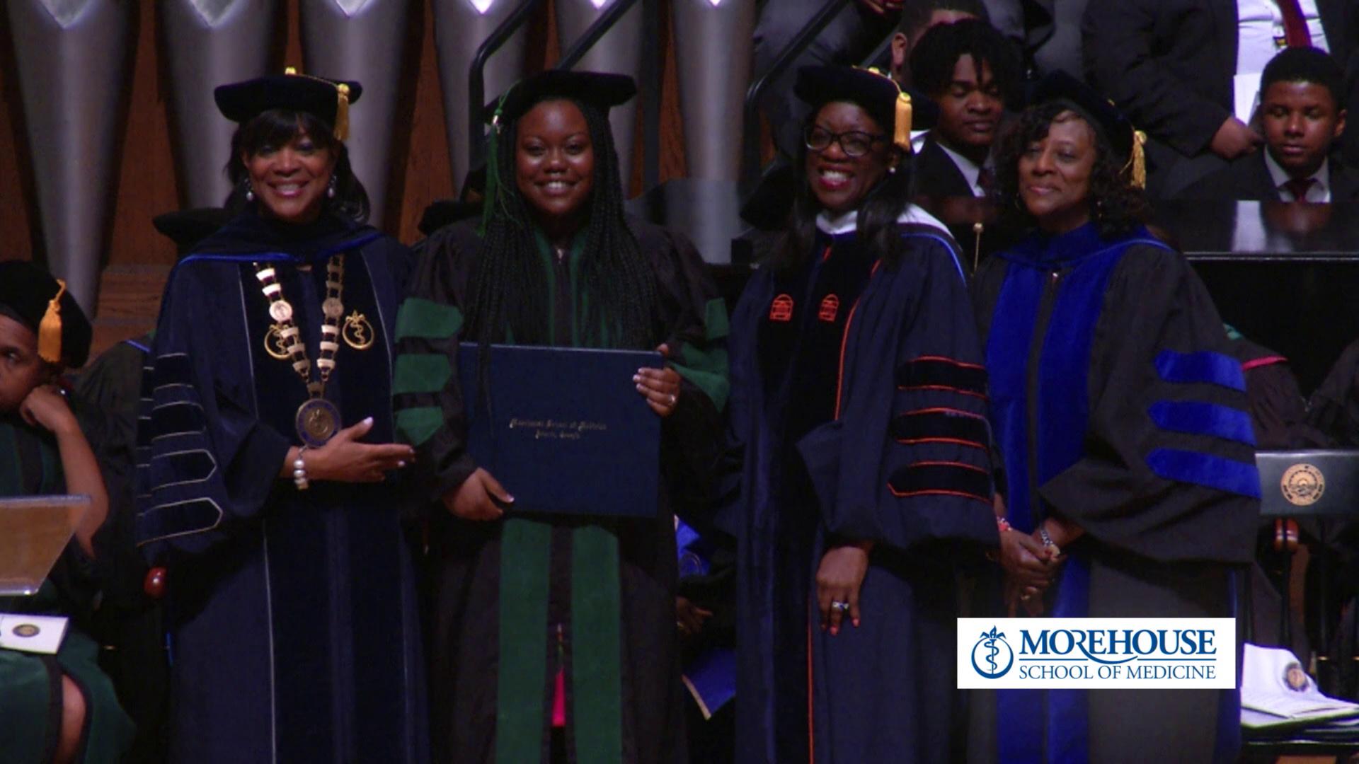 Close up of four Morehouse School Medicine graduates as shown on the event live stream