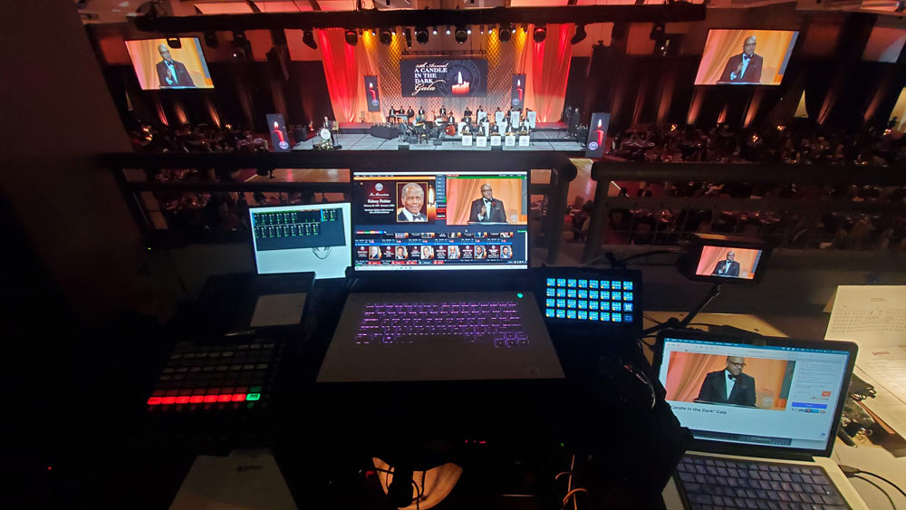 view of Atlanta political gala event from behind control board